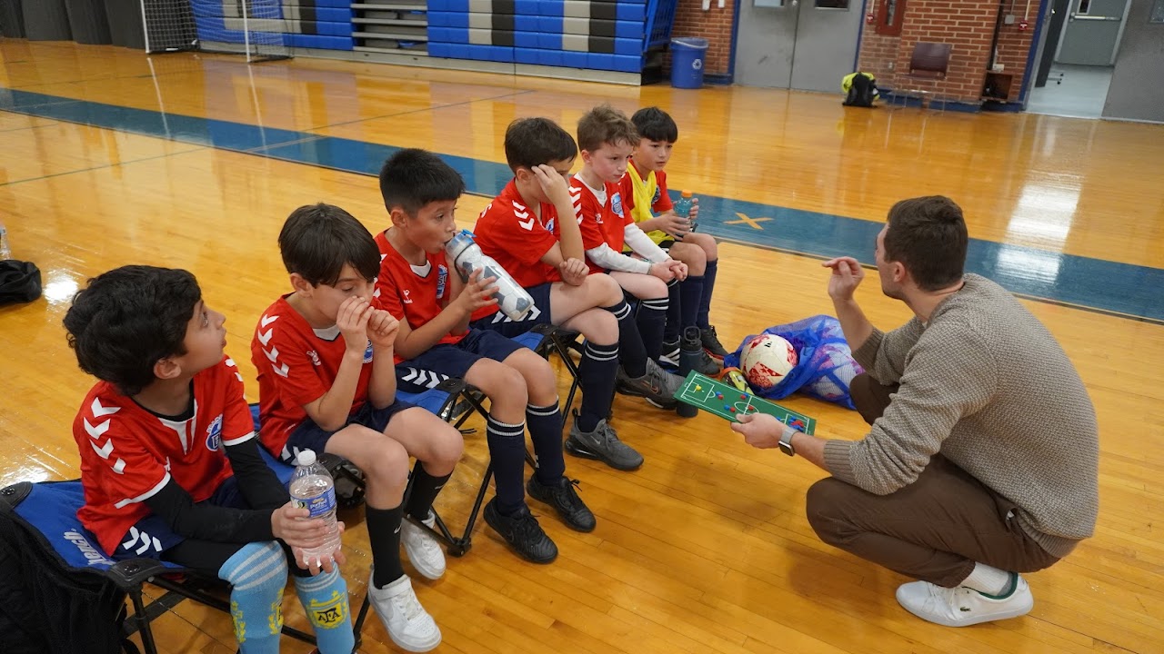 Coach Craig coaching on the field